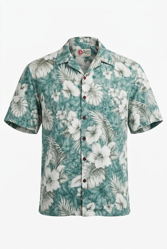 Chemise hawaïenne Hilo Hattie verte à fleurs blanches, manches courtes et col ouvert — Seconde Main VestiaireFMR