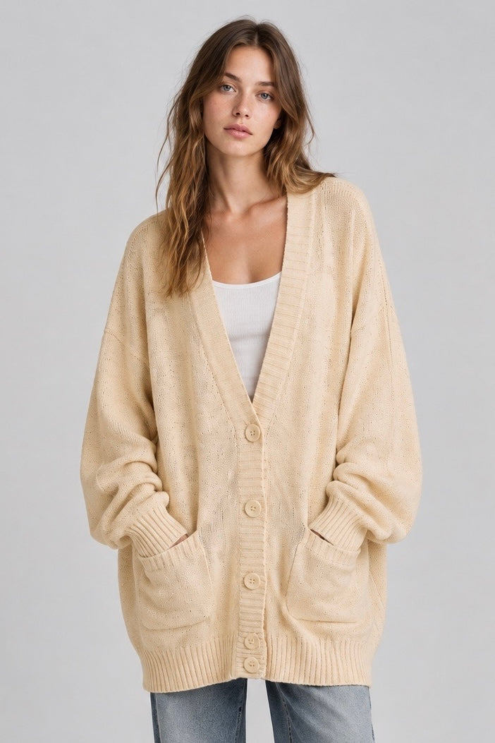Cardigan Sonia Rykiel crème oversize, col V et poches, porté de face — Seconde Main VestiaireFMR