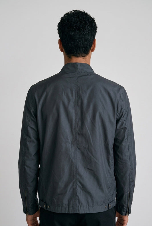 Jeune homme de dos portant une veste Ps Paul Smith homme – Seconde main luxe – VestiaireFMR Genève Suisse