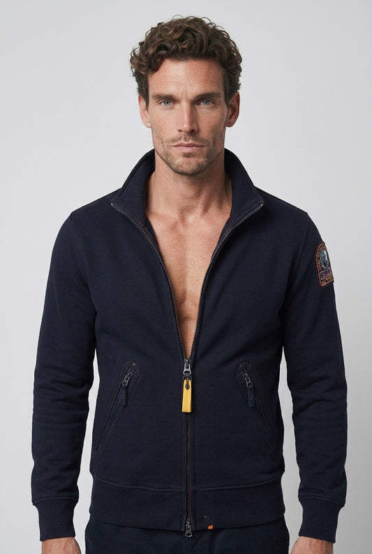 Home portant une jaquette Parajumpers – Seconde main luxe – VestiaireFMR Genève Suisse